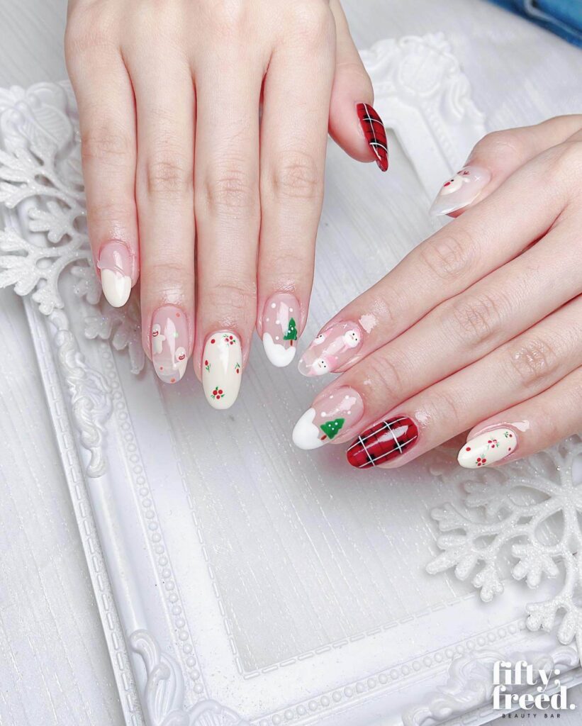 Festive Christmas gel nails featuring red, green, and white designs, including snowflakes, candy cane stripes, and Christmas tree accents.