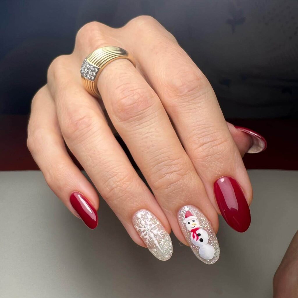 Festive Christmas nail art designs featuring snowflakes, candy cane stripes, and gingerbread nail details.