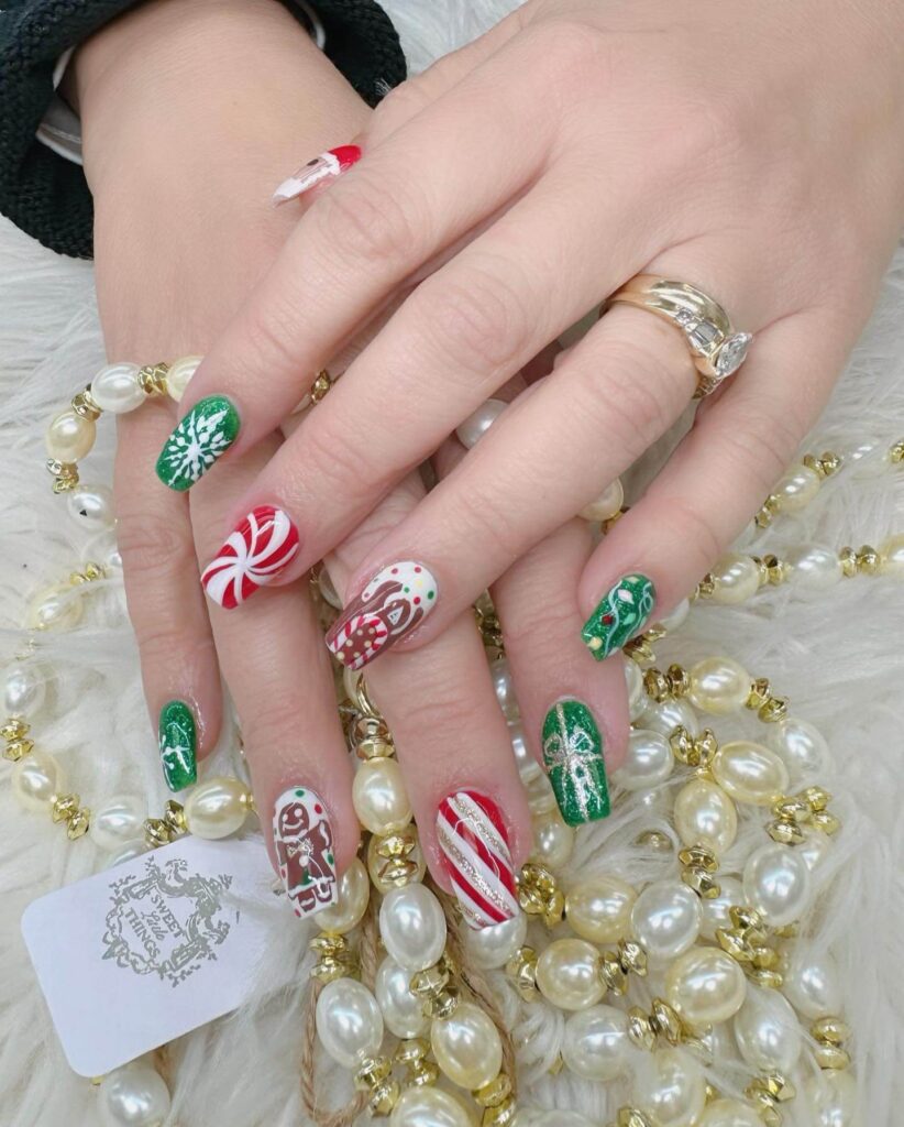 Festive Christmas nail designs featuring red and green nails with glitter accents, snowflakes, and holiday-themed nail art.