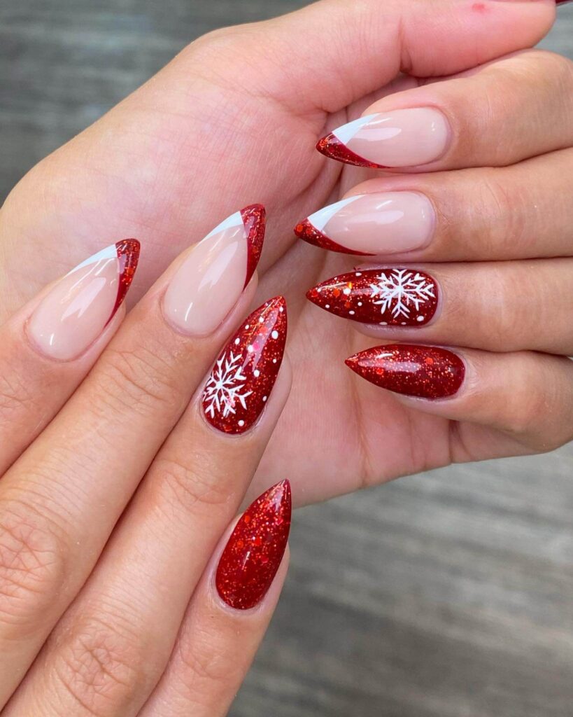 Festive Christmas nail designs featuring red and green nails with glitter accents, snowflakes, and holiday-themed nail art.