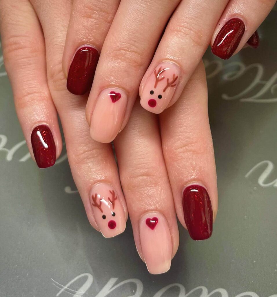 Christmas nail designs featuring snowflakes, reindeer nails, and Christmas tree nail art, perfect for the holiday season.