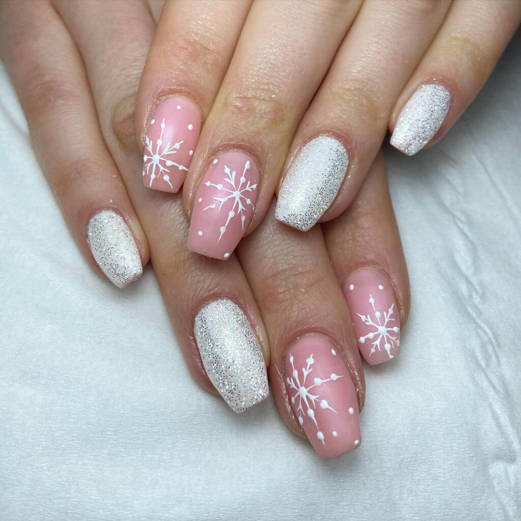 Christmas nail designs featuring snowflakes, reindeer nails, and Christmas tree nail art, perfect for the holiday season.