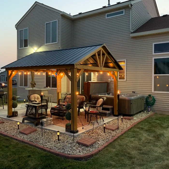 Backyard ideas with stylish landscaping featuring sloped yard solutions, no-grass designs, and modern patio layouts.